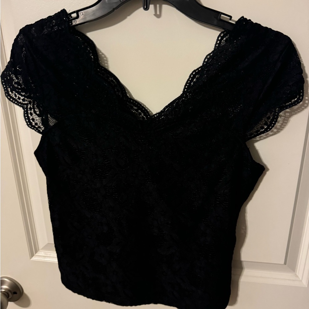 Brand new, never worn, black lace fitted crop-top, size medium